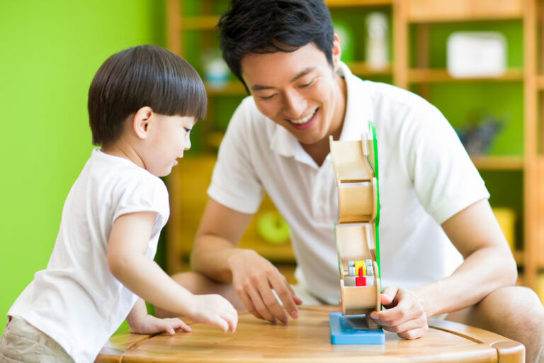 father-and-daughter-playing-toy-slide-2024-10-18-04-37-33-utc